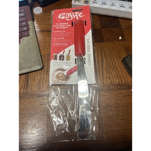 The Ultimate PB knife. Stir scrape and clean the BIG Jars Red 1 - Picture 1 of 2